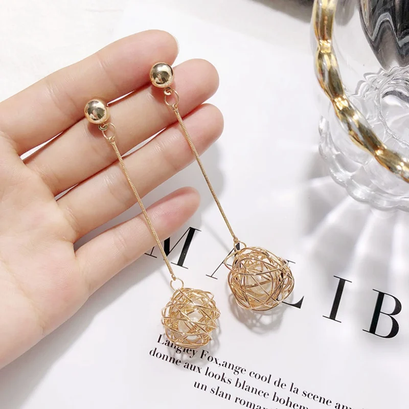 

New Hot Hollow Imitation Pearls Ball Long Stud Earrings For Women Cute Wire Knit Round Fashion Jewelry Brincos Pendientes Bijoux