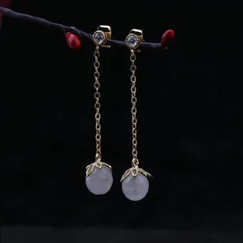 

The designer hand long pendant earrings