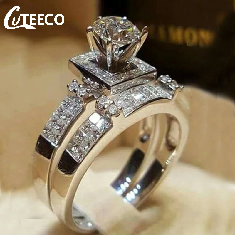 

CUTEECO 2Pcs/set Charm Lovers Ring Bijoux Femme Fashion Jewelry Silver Crystal Engagement Wedding Rings For Couple Hot Sale 2018