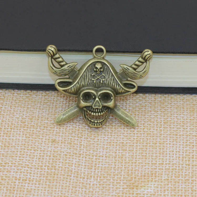 

Hot Selling 10 Pieces/Lot 40mm*33mm Metal Diy Jewelry Making Charm Antique Bronze Pirate Head Skull Charms