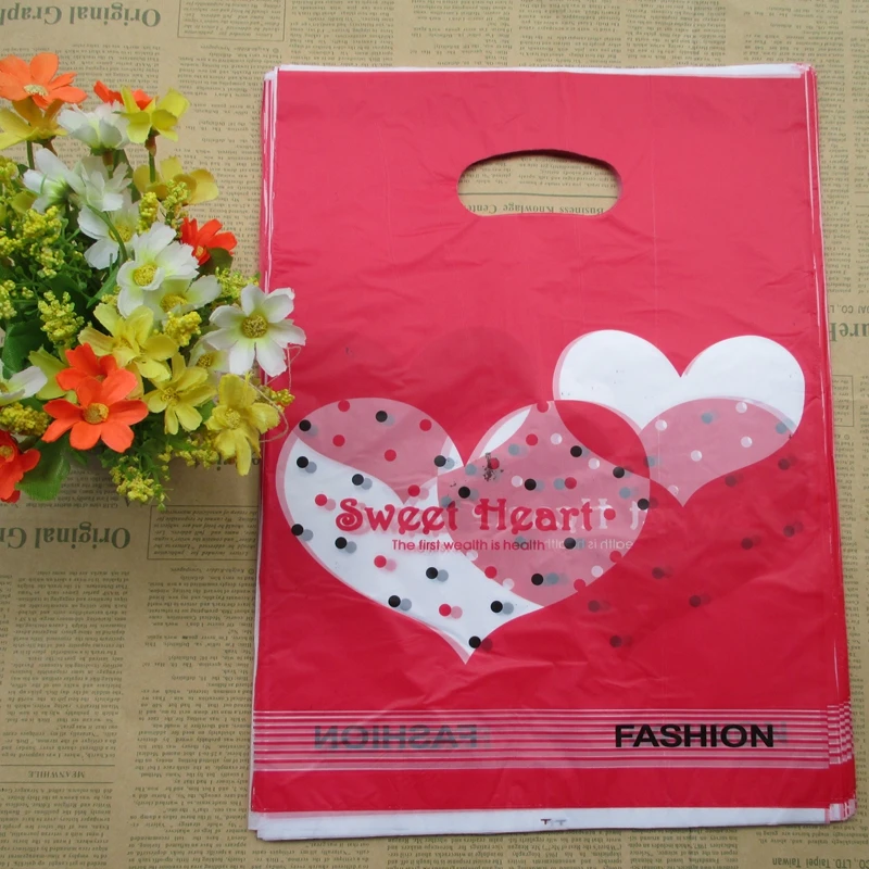 100pcs wholesale 25*20cm red Color heart Gift Bags Plastic Boutique