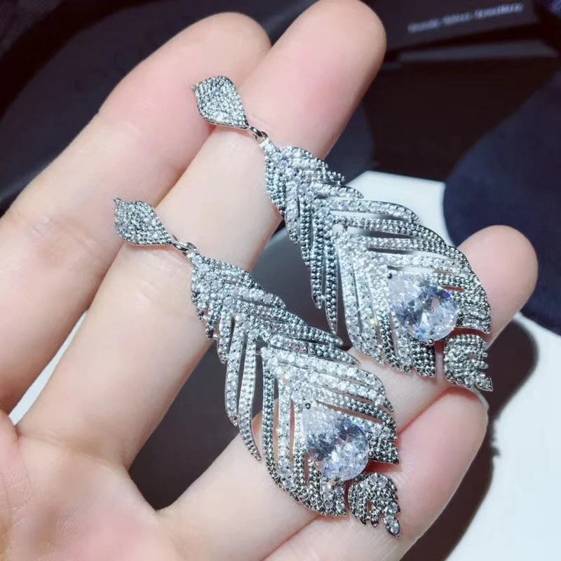 

XF Hot Copper Zircon Luxury Feather Star Stud Earring Women Wedding Hollow AP Zircon 925 Silver Ear Pin Jewelry