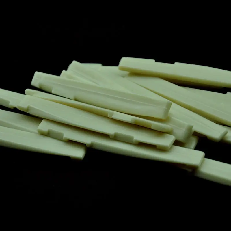 Lots of 50pcs ABS Plastic Acoustic Guitar Compensated Saddles Lower Nuts Beige | Спорт и развлечения
