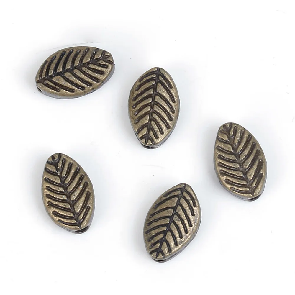 

DoreenBeads Zinc Based Alloy Antique Bronze Spacer Beads Leaf DIY Findings 9mm( 3/8") x 6mm( 2/8"), Hole: Approx 1.5mm, 100 PCs