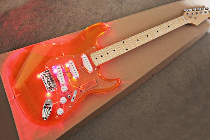 

OEM Orange Acrylic Glass Electric Guitar with Colorful Lights,Maple Fretboard,Chrome Hardwares,offering customized services