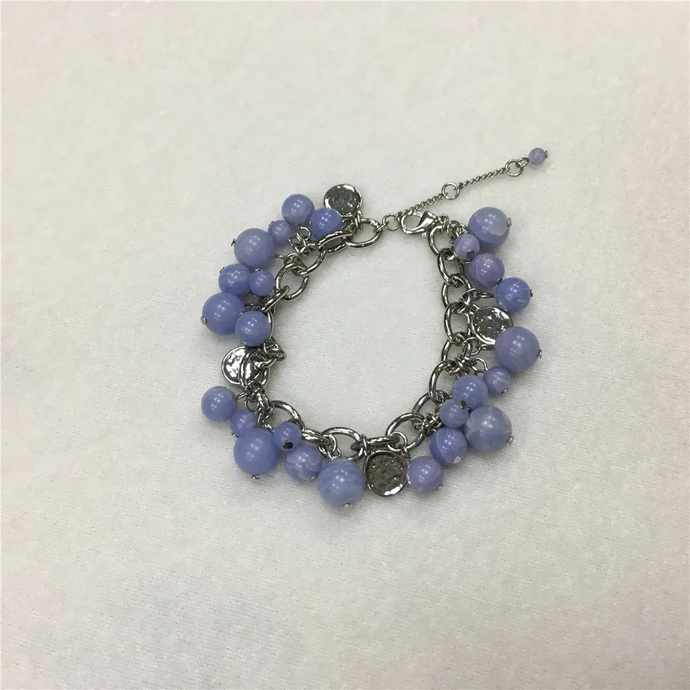 

Light blue natural stone charm bracelet