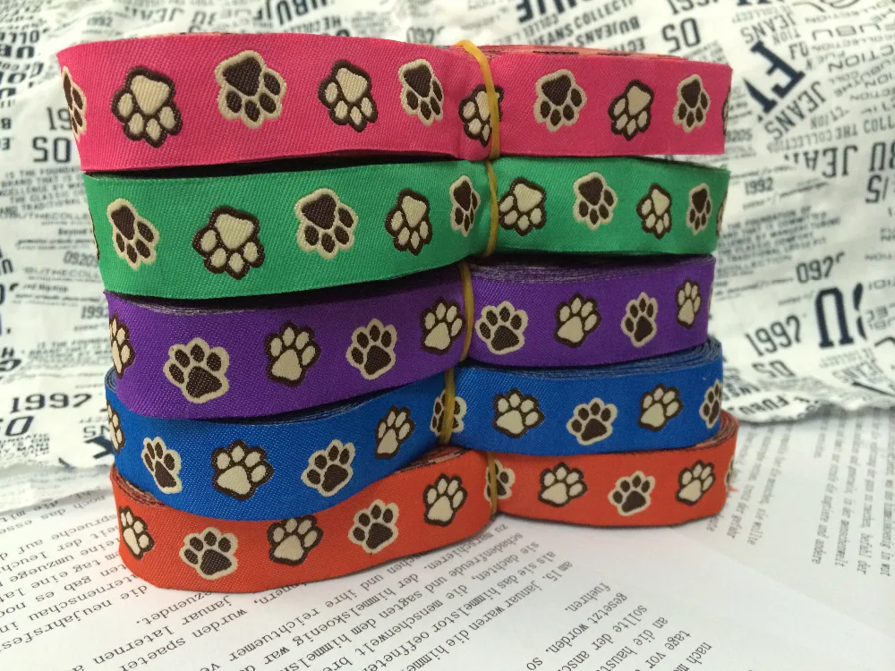 

2014 NEW wholesale 7/8'(22 mmx10yards) 100% Polyester Woven Jacquard Ribbon cartoon ribbon 5 colors with Paw prints