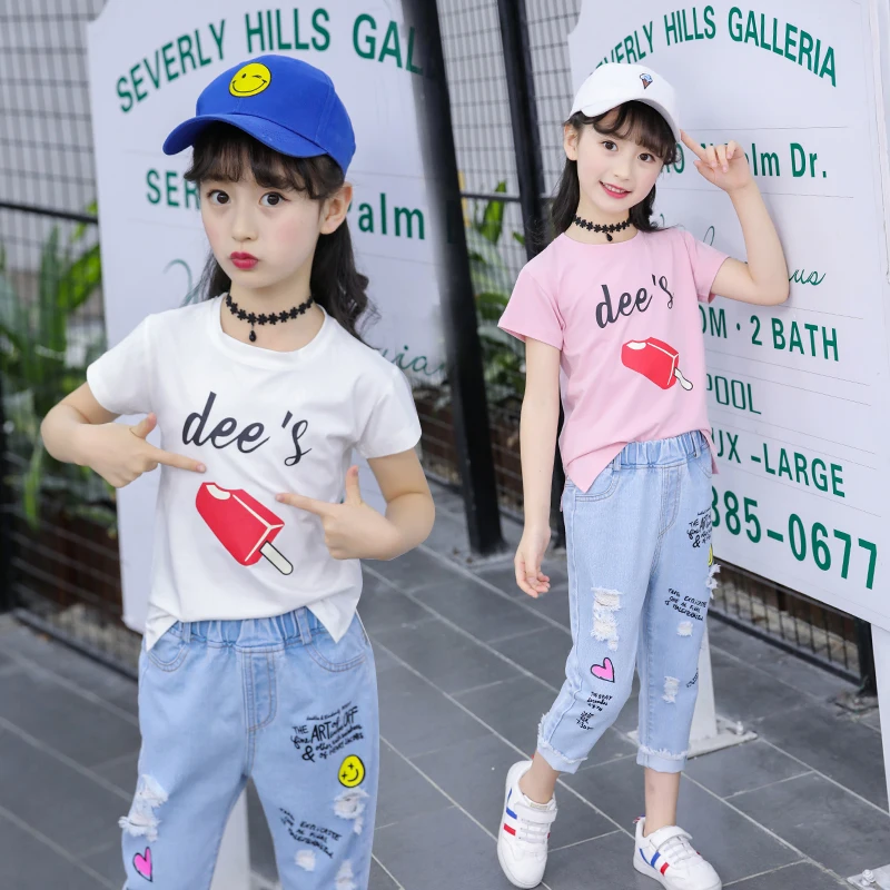 

Brand girl summer Fashionable Cartoon Short sleeve Frivolous T-shirt +printing Denim hole Cropped Trousers kids Clothes Short