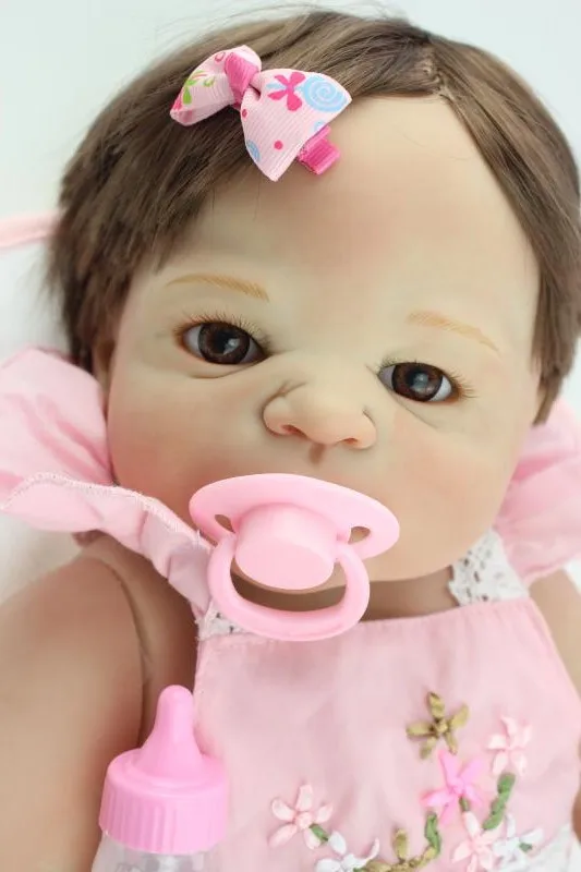 

2016 New Arrival 58cm NPK Brand Baby Girl Doll In Pink Skirt Full Vinyl Silicone Reborn Babies Toys For Kids Brithday Brinquedos