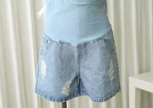 Новые модные джинсовые шорты для беременных летние джинсы для беременных женщин с эластичной талией Шорты женский Кнопка необработанный низ хлопковые шорты