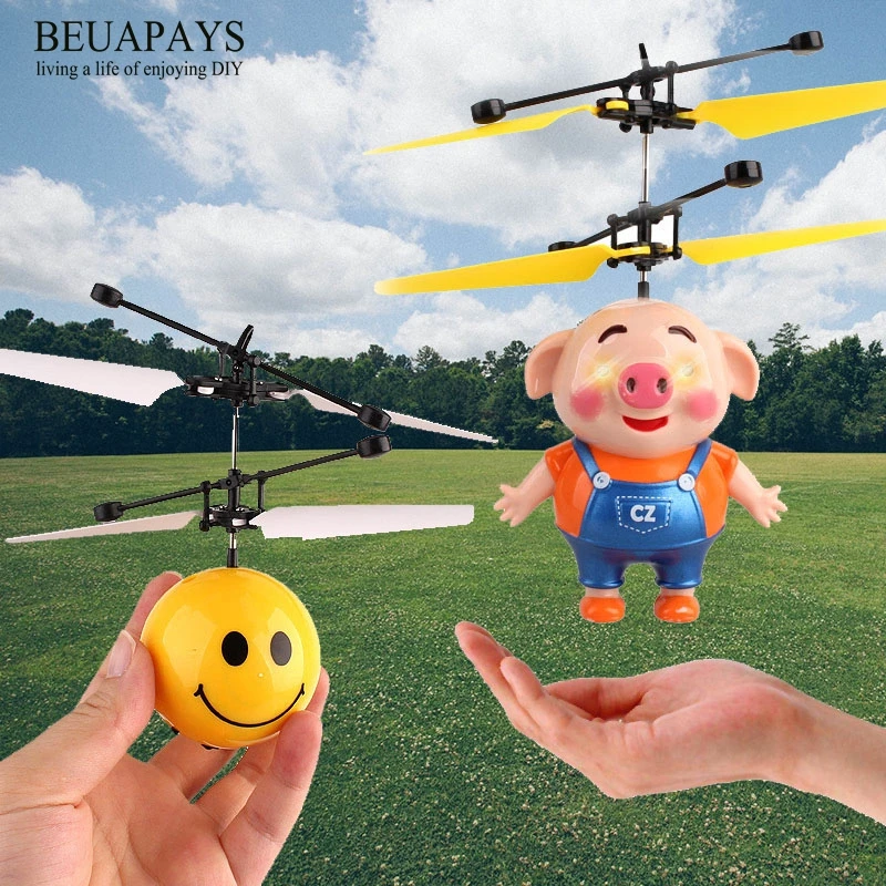 

1pcs hogar figurines DIY Induction aircraft mini pigs anti falling suspension remote control helicopter stalls charging children