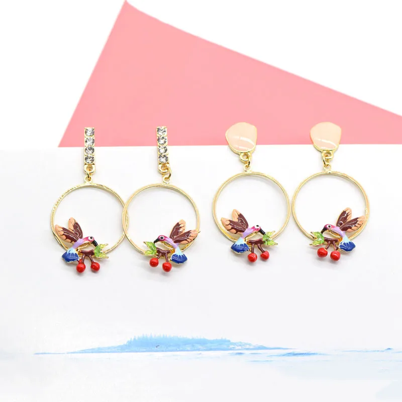 

Enamel glaze bird cherry wreath earrings fresh forest girl flying bird hummingbird five-star earrings female
