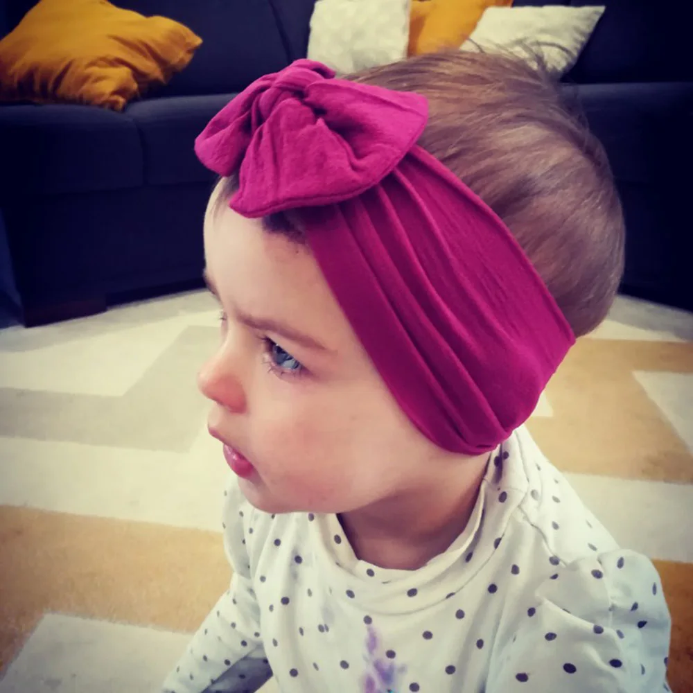 Moda Americana Europea Color sólido Bowknot Niños del bebé Diadema elásticos bebé recién Nacido Diadema Accesorios para el Cabello Color: Rosa 
