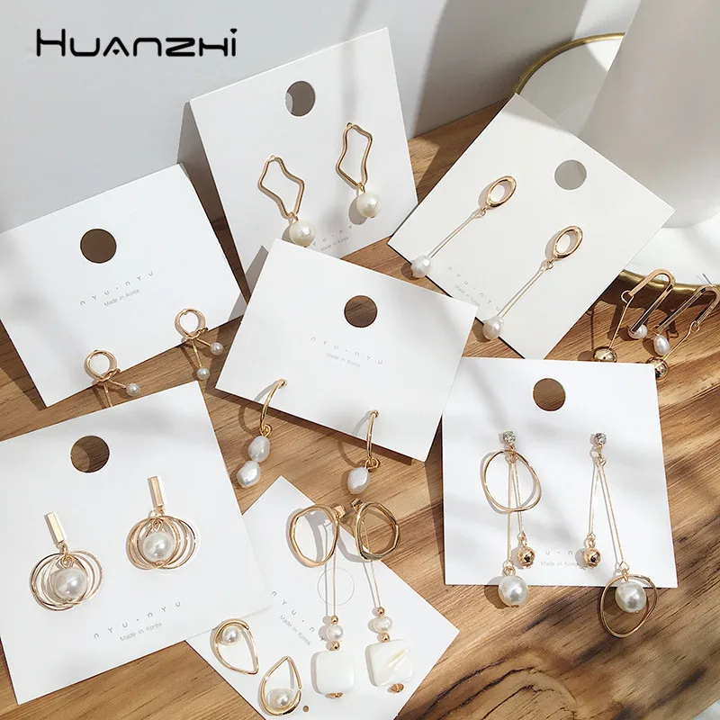 

HUANZHI 2019 New Imitation Pearls Geometric Gold Color Metal Distortion Chic Design Drop Earrings For Women Party Jewelry Gifts