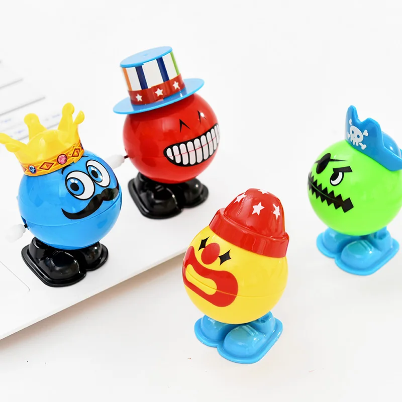 Colorful Funny Face Running Clockwork Wind up Toy Baby Spring Toy Plasticin Wind Up Toys from