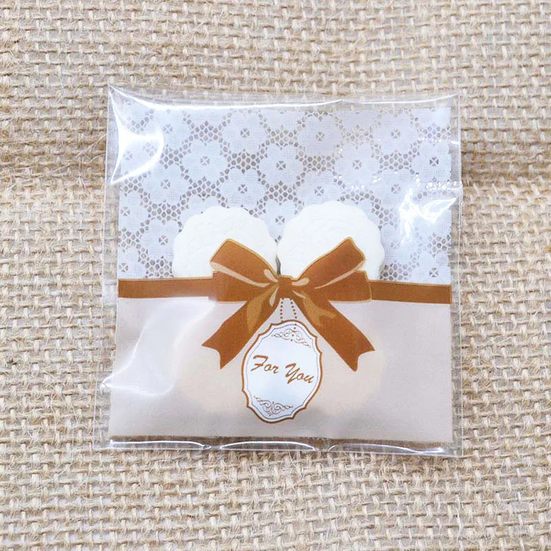 

50pcs Cute Bow Design Cake Gift Packages OPP Bags White/Clear Plastic Candy Cookies Biscuits Bags Wedding Party Supplies