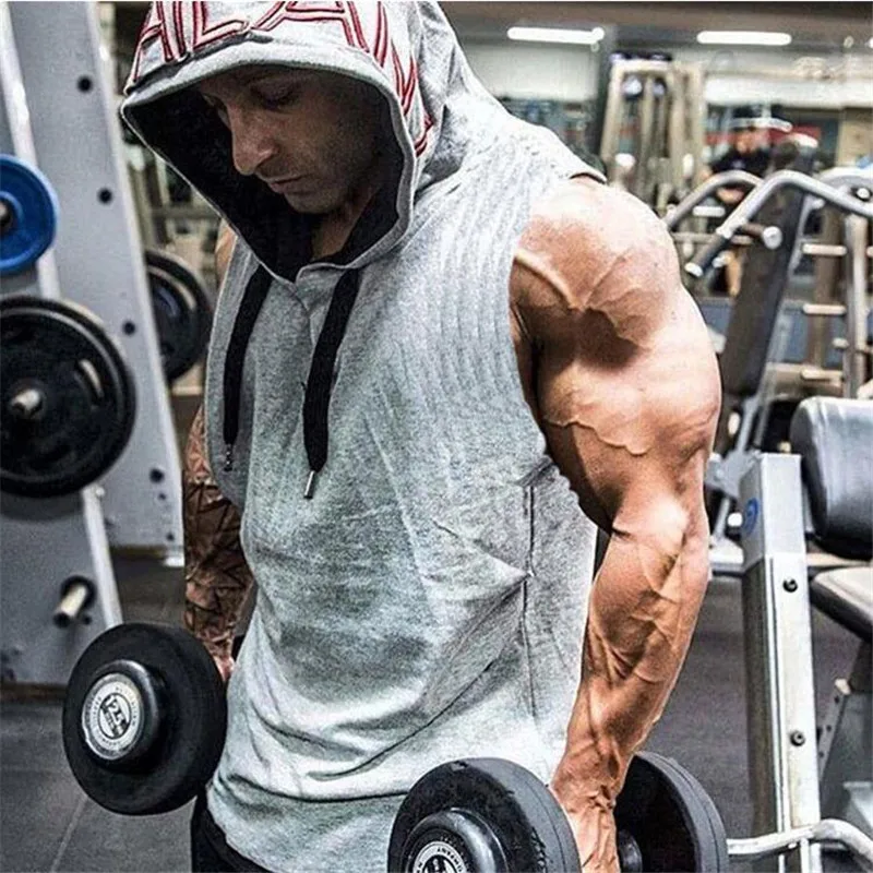 Bodybuilder in a Hood in the Gym