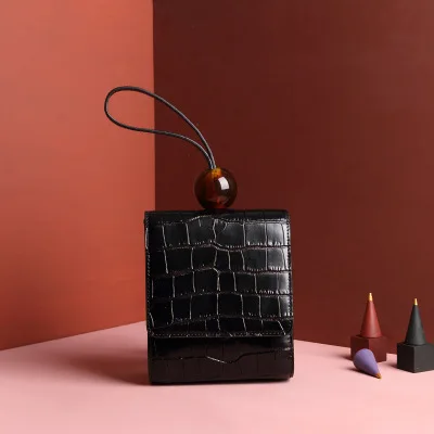 

Spring new European and American style leather beaded handbags solid color shoulder portable Messenger small square bag