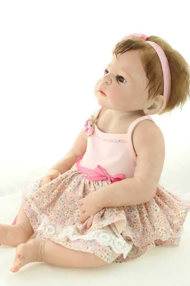 

NPKcollection 58cm full silicone High simulation reality baby girl with small Floral harness skirt silicone reborn baby dolls