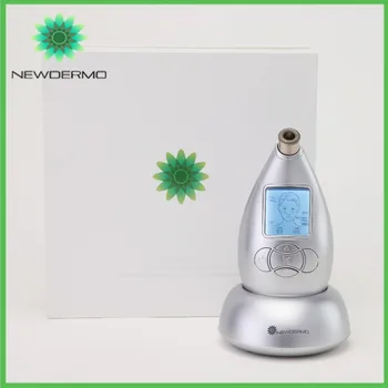

Silver NEWDERMO Power Peel Handheld Skin Dermabrasion Machine For Home Skin Massage Rejuvenation