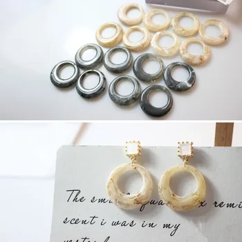 

Wholesale Trendy 30pcs/lot 27mm geometry hollow rounds shape resin beads diy jewelry earring/garment pendant accessory