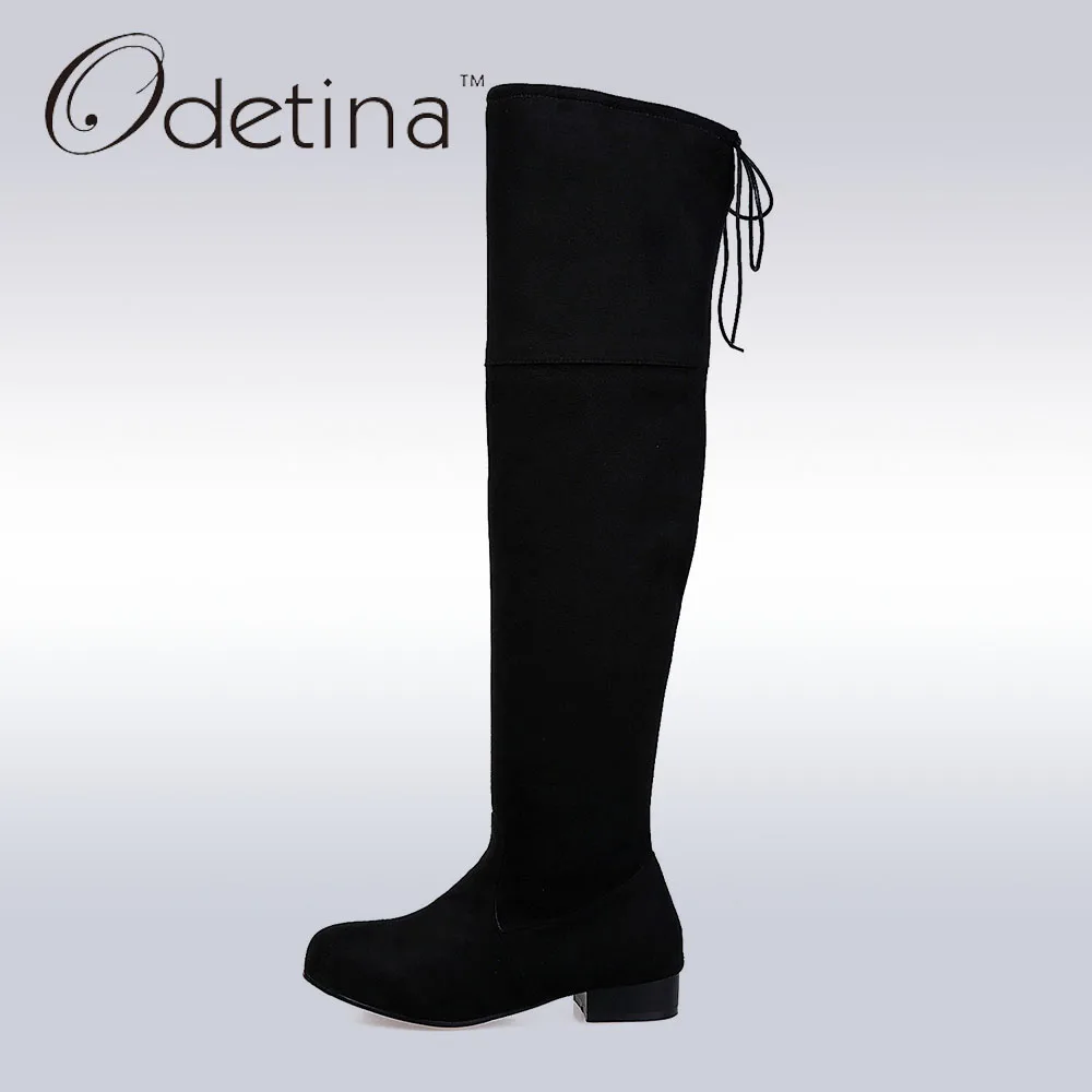 flat heeled thigh high boots