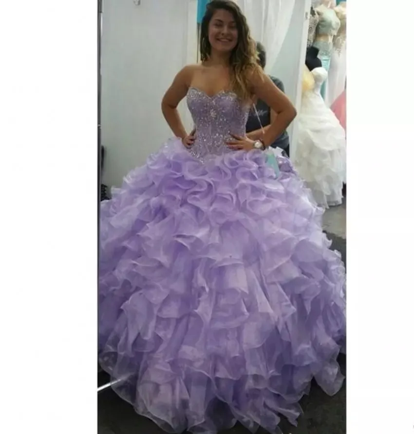 online-lavender-sweet-16-quinceanera-dresses-with-luxury-crystals-beaded-ruffles-organza-ball-gown-prom-dresses-formal-wear.webp (1)_