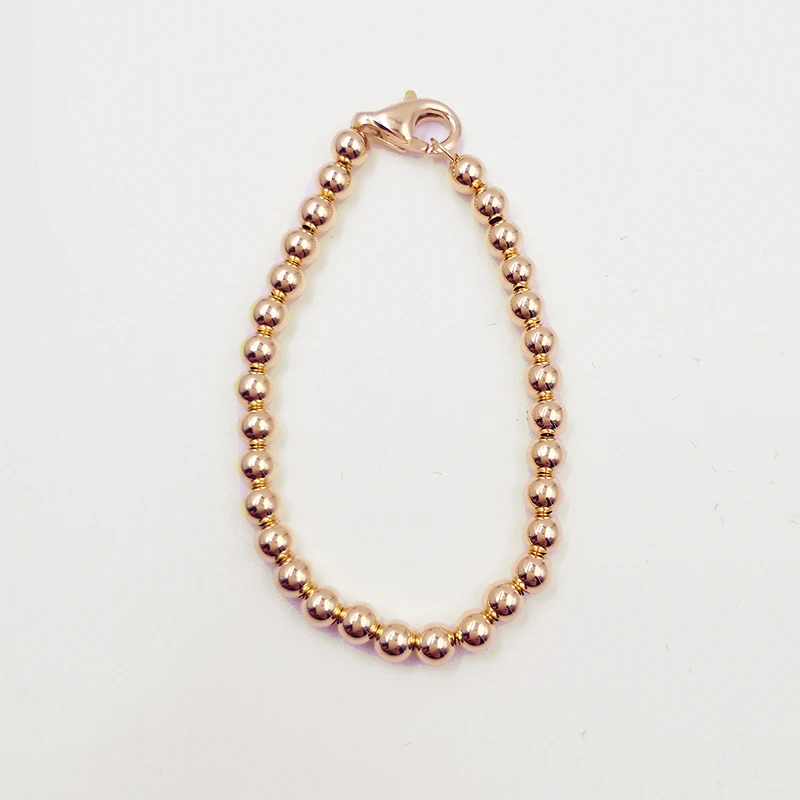 Rose gold small bead strand bracelet 