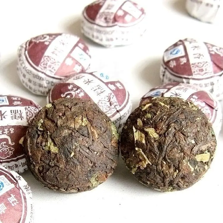 Китайский чай пуэр в таблетках. Китайский прессованный чай пуэр. Китайский чай пуэр в таблетках. Шу шен пуэр таблетки. Шу шен пуэр таблетки.