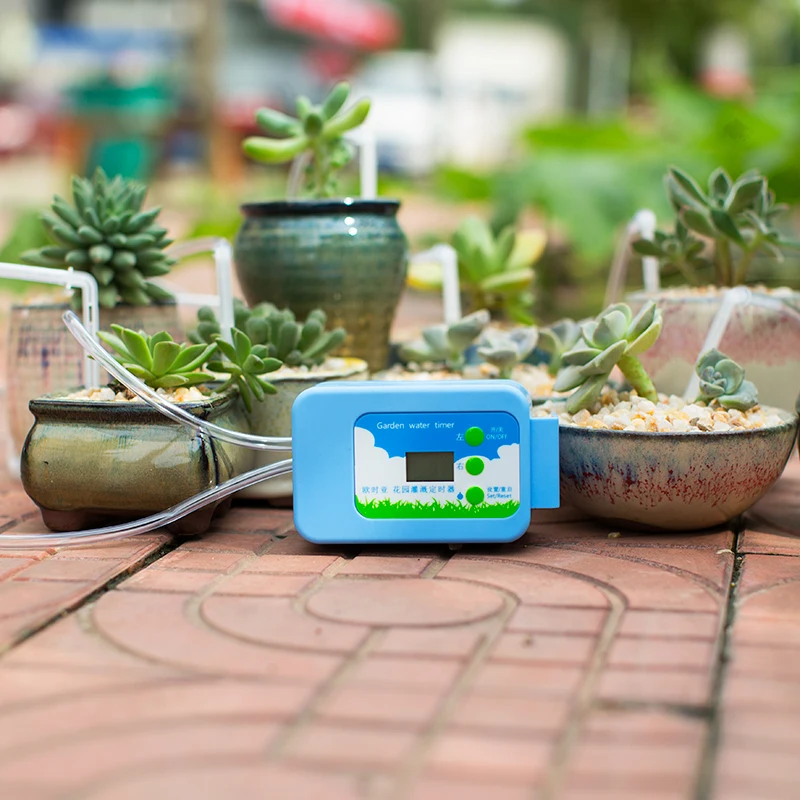 Automatic Drip Irrigation System Pump Controller Watering Kits with Built-in High Quality Membrane Pump Used Indoor Automatic Drip Irrigation System Pump Controller Watering Kits with Built-in High Quality Membrane Pump Used Indoor