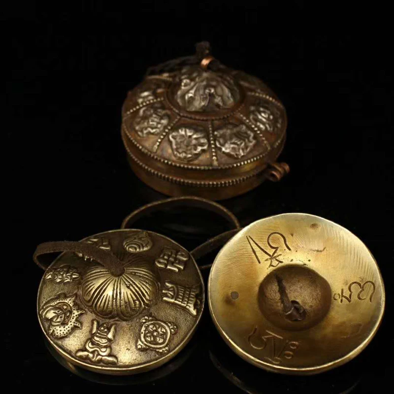 

A set of Chinese Tibetan collected old-style handmade copper musical instruments used in a Buddhist