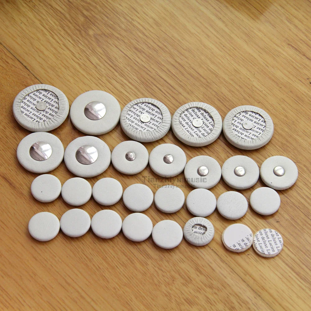 

1 set=28pcs Advanced real leather bass clarinet pads