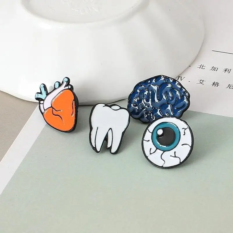 

Cute Korean version of the jewelry color drops of human body brooches brain eyes tooth brooch accessories wholesale Pin Badge