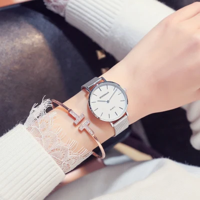 

Korean fashion women's watch student casual quartz watch men and women trend retro belt couple table large and luxurious
