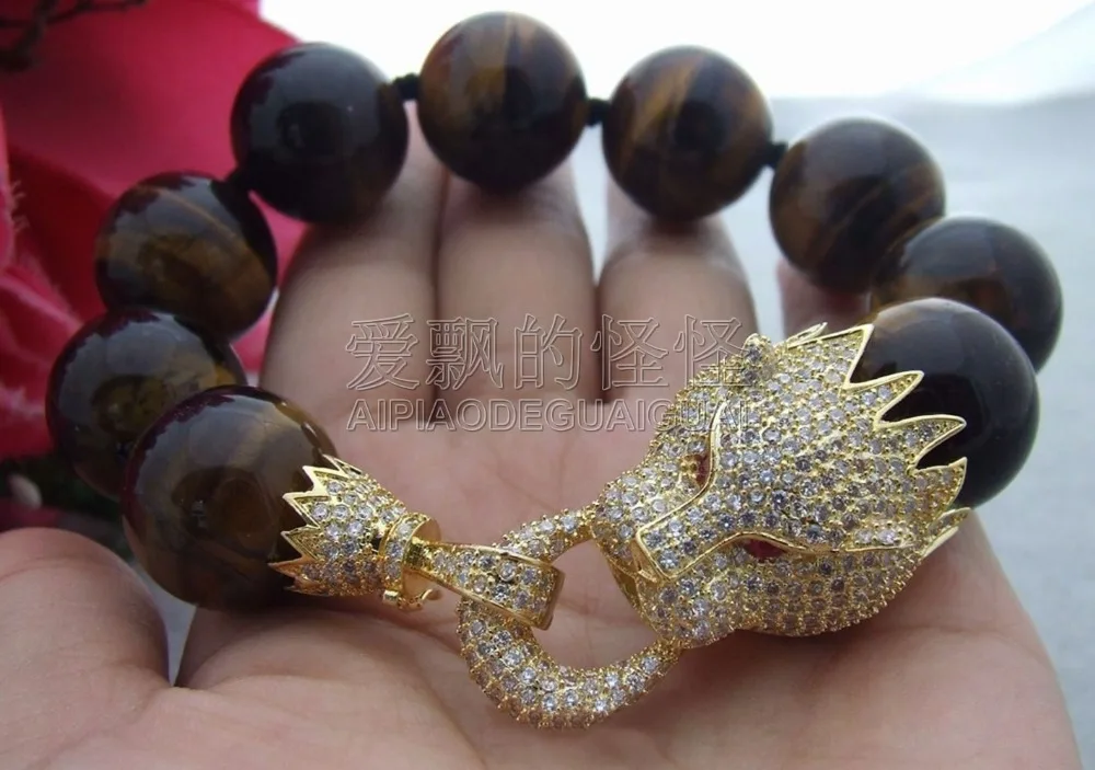 

B051014 9" 18MM Tiger's Eyes CZ Clasp Bracelet
