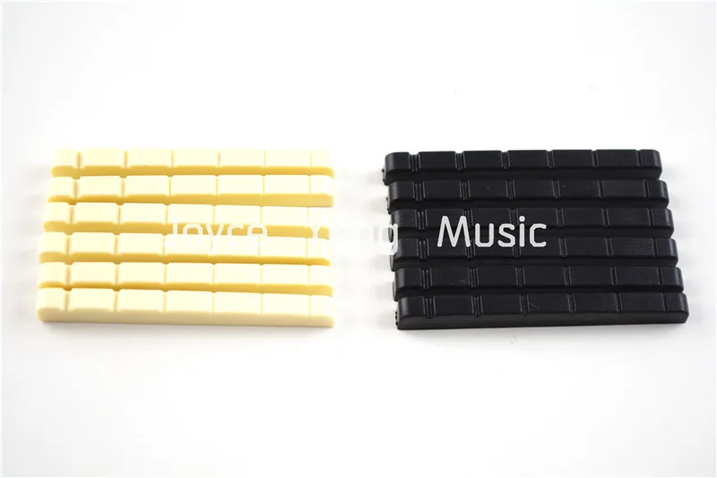 

12pcs of Electric Guitar Nuts A028A Ivory&Black Free Shipping Wholesales
