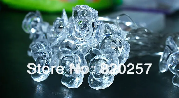 

Free shipping 2pcs/lot led string with rose shape10m 100leds christmas decorative light AC220V with controller and plug