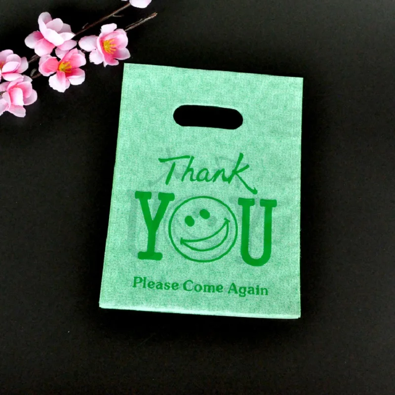 

100pcs/lot 15x20cm Green "Thank You" and Smile Printed with Handle Plastic Bags Cheap Candy Gifts Storage Packaging Bags Pouches