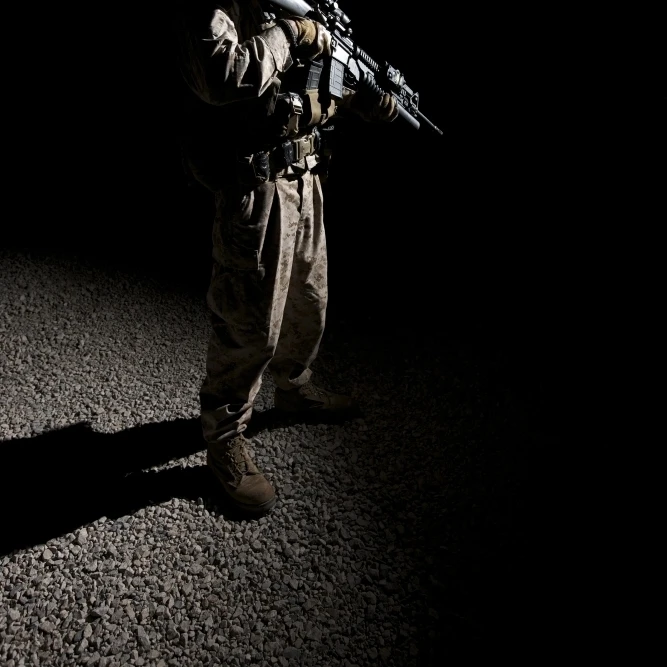 Partially silhouetted U.S. Marine in Afghanistan Poster Print (11 x 17)