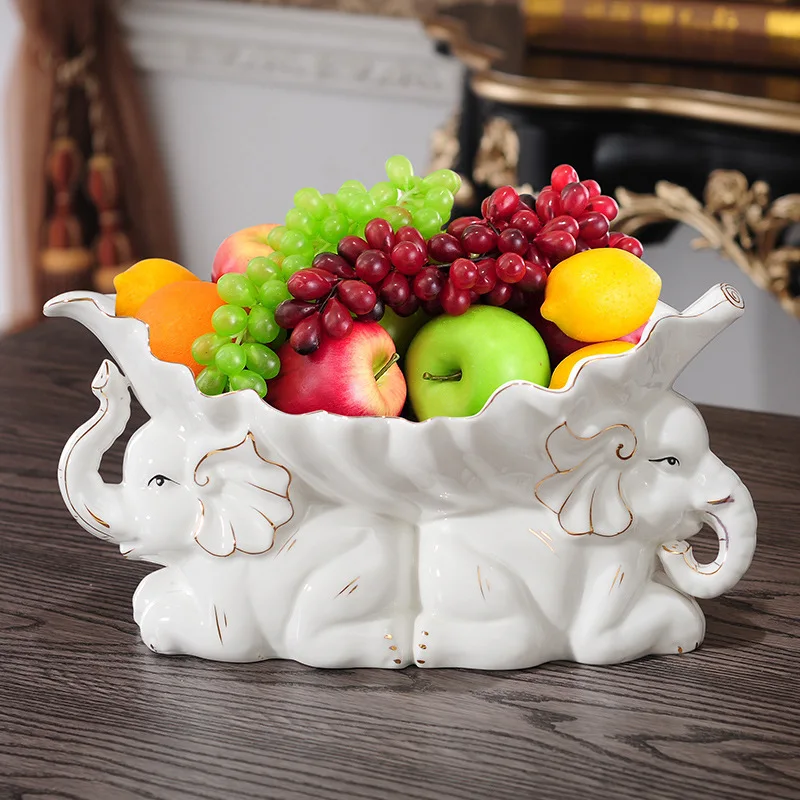 

Simple modern style Ceramic elephant shaped fruit platter white gold animal home decoration put a piece of fruit plate