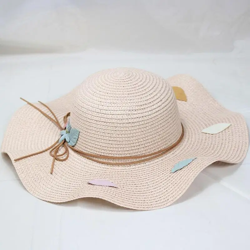 SUOGRY 2019, новая мода лето волна женская соломенная шляпа Пляжные шапки Лук цветок широкими полями шапки женский головной убор шляпа