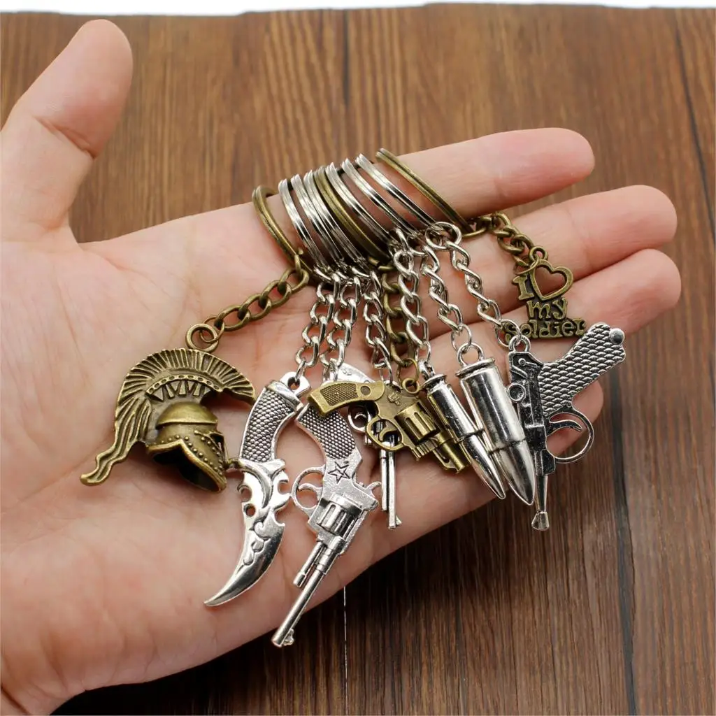 

3D Helmet Keychain Bullet Keychain Mini Weapon Gun Game Car Metal Gun Keychain Men Gift