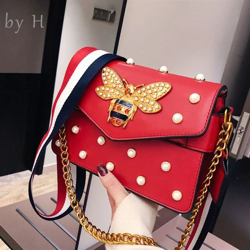 

by H 2019 new high quality female shoulder bag pearl clutch womens luxury messenger bag guitar wide strap bag metal chain slim