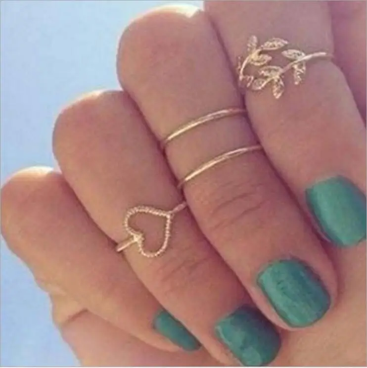 

4pcs/set Fashion Hot Creative Charming Silvery/gold Resizable crystal Leaf Pattern Romantic Women Lady Girl Party Ring