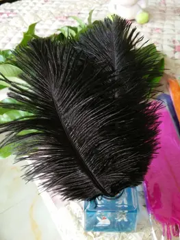

Sell high quality 50pcs / lot black ostrich feather 10-12 "/ 25-30cm, DIY jewelry accessories / Custom Colors