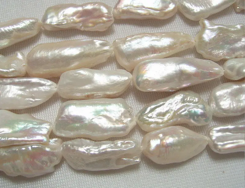 

8PE02104 9x27mm White Biwa Pearls 15''
