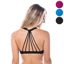 Woman paddled sports bra cross back low support strappy yoga bra