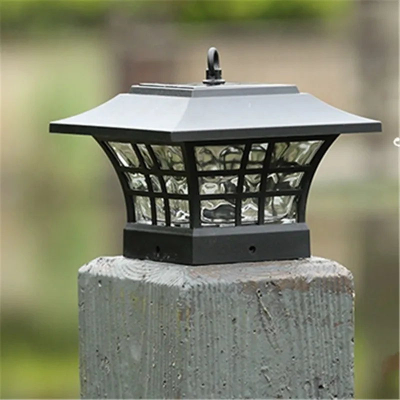 Koop Nieuwe LED Solar Panel Dual gebruik Muur Pijler Verlichting Waterdicht Landschap Tuin Outdoor Straat Lamp Retro Nieuwjaar Garland decor