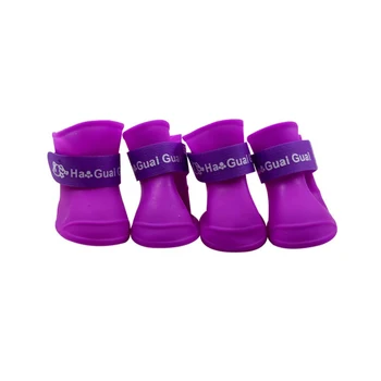 The pet dog boots with four silicone antiskid shoes wear waterproof dogs shoes candy colored