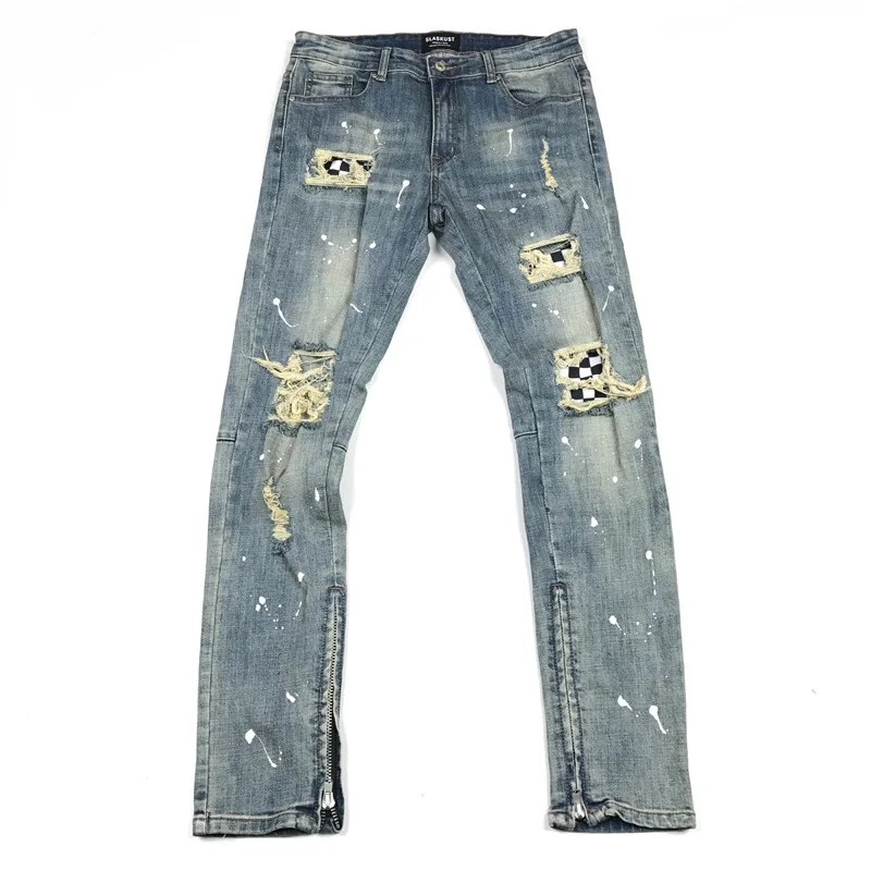 ripped jeans with checkered patches